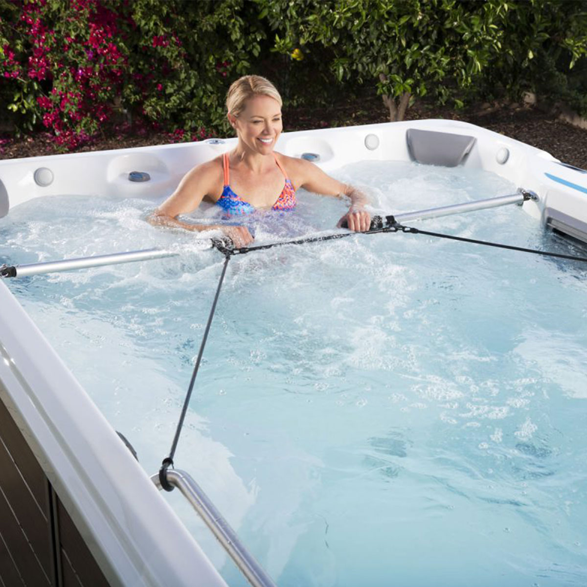 woman exercising in a swim spa