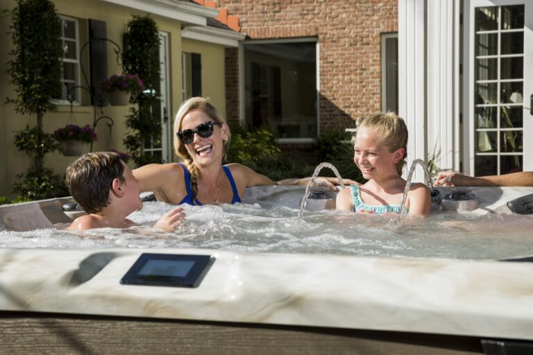 |mom enjoying mother's day with kids in a best life hot tub