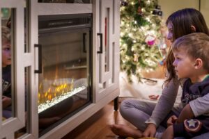 kids are looking at electric fireplace